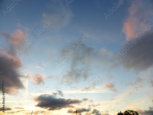 The sky is blue, clouds at sunset