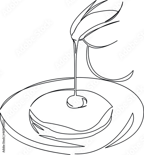 pancake poured with syrup