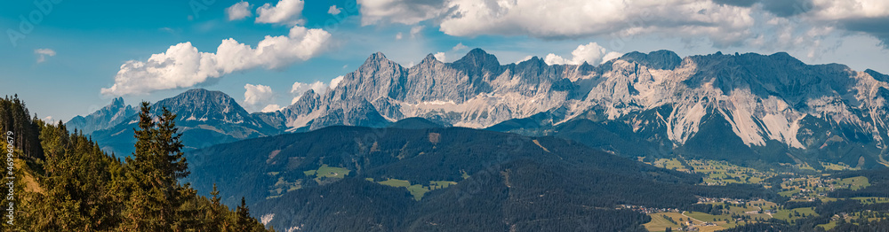 High resolution stitched panorama of a beautiful alpine summer view with the famous Dachstein mountains in the background at the Reiteralm, Pichl, Schladming, Steiermark, Austria