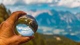 Crystal ball alpine landscape shot with the famous Dachstein mountains in the background at the Reiteralm, Pichl, Schladming, Steiermark, Austria