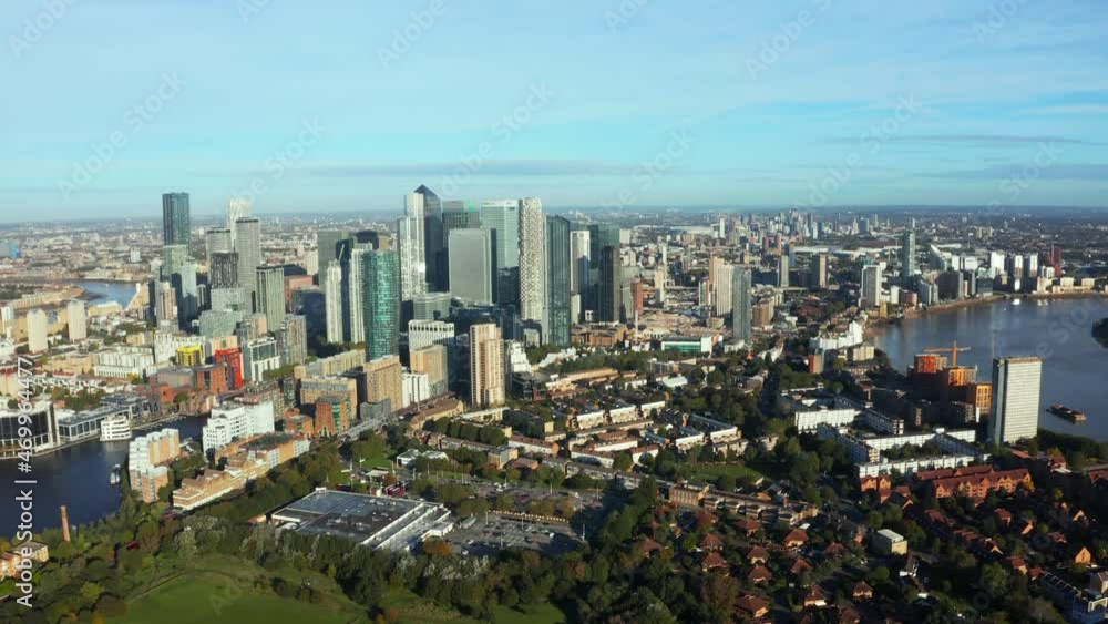 Aerial panoramic view of the Canary Wharf business district in London, UK. Financial district in London. Aerial panoramic view of the Canary Wharf business district in London, UK. Financial district in London.