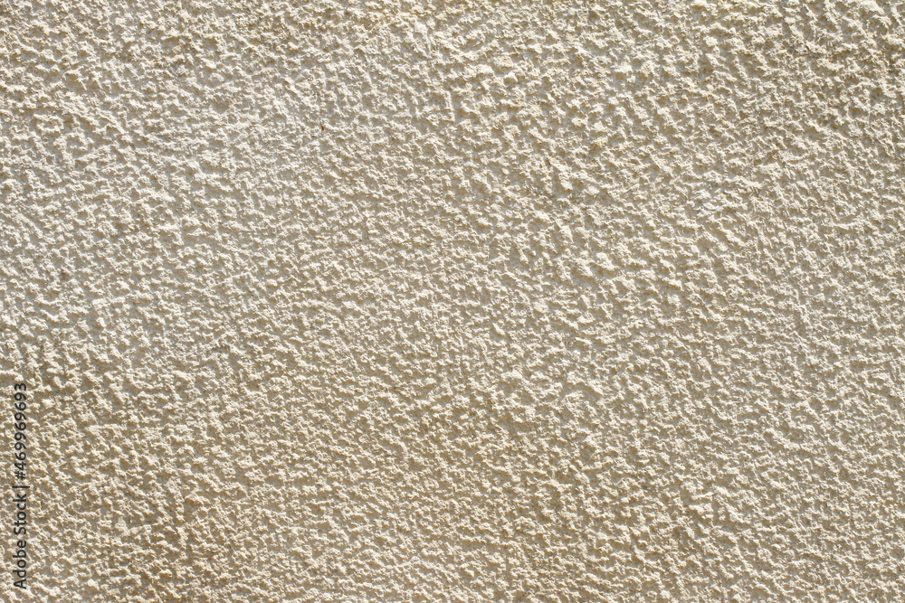 Texture background of old white plastered wall with peeling paint Texture background of old white plastered wall with peeling paint