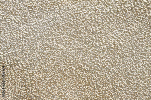 Texture background of old white plastered wall with peeling paint