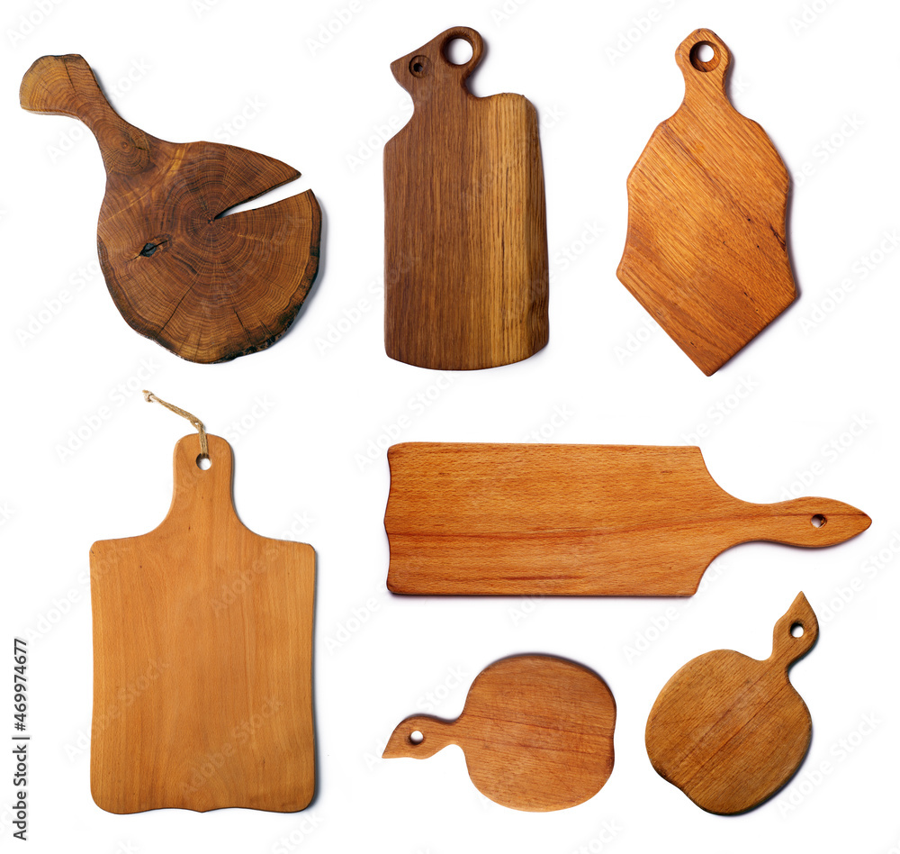 Set of kitchen wooden boards on a white background. Kitchen utensils Set of kitchen wooden boards on a white background. Kitchen utensils