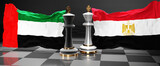 United Arab Emirates Egypt summit, meeting or aliance between those two countries that aims at solving political issues, symbolized by a chess game with national flags, 3d illustration