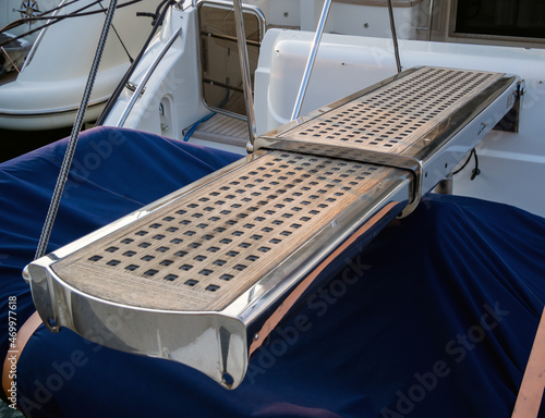Retractable ship gangway on a yacht photo