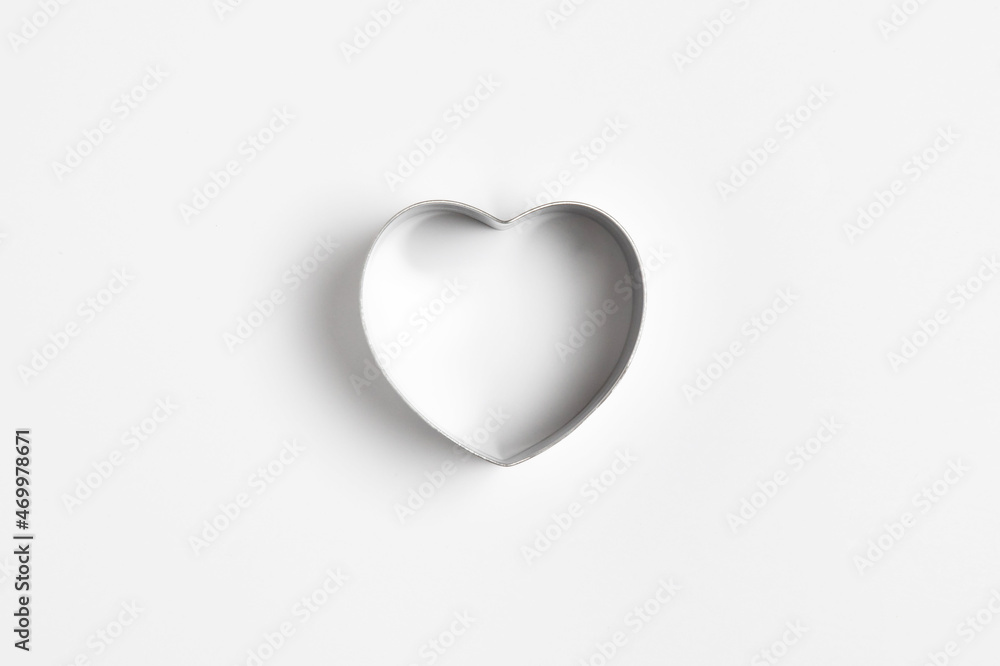 Heart-shaped mold  isolated on white background.High-resolution photo.Mock up