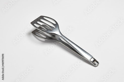 Serving kitchen cooking Tongs isolated on a white Background.High resolution photo.Mock up