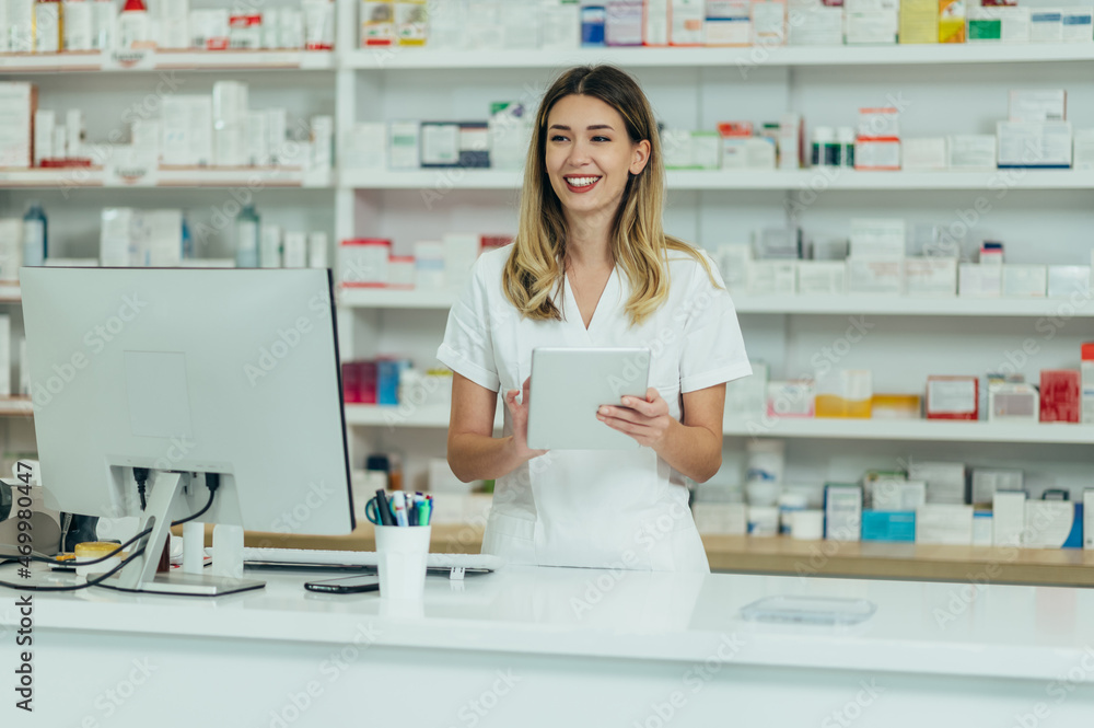 Portrait of a beautiful female pharmacist working in a pharmacy
