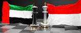United Arab Emirates Indonesia summit, meeting or aliance between those two countries that aims at solving political issues, symbolized by a chess game with national flags, 3d illustration