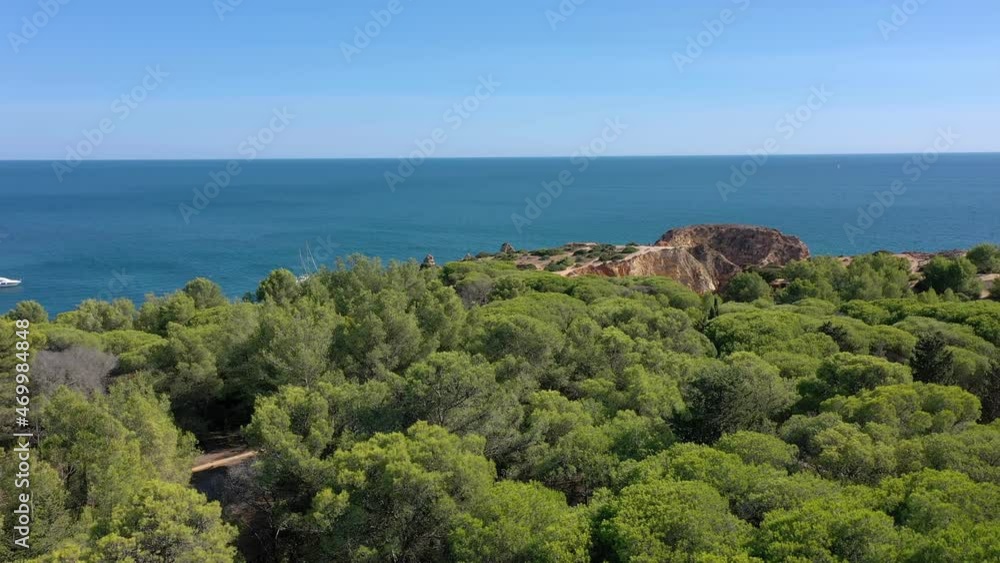 Delightful aerial view of Portuguese rocky beaches near the city of Portimao. For the rest of tourists. Algarve. Delightful aerial view of Portuguese rocky beaches near the city of Portimao. For the rest of tourists. Algarve.