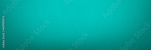 Light green sea color textured paper background. Panorama texture green cardboard seamless pattern. Large format photo for print or banner. For your project or design.