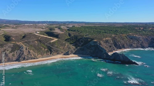 Aerial view of the Portuguese mountain coastline, Vicentina. Aljezur village, beach Vale dos Homens. Sagres
