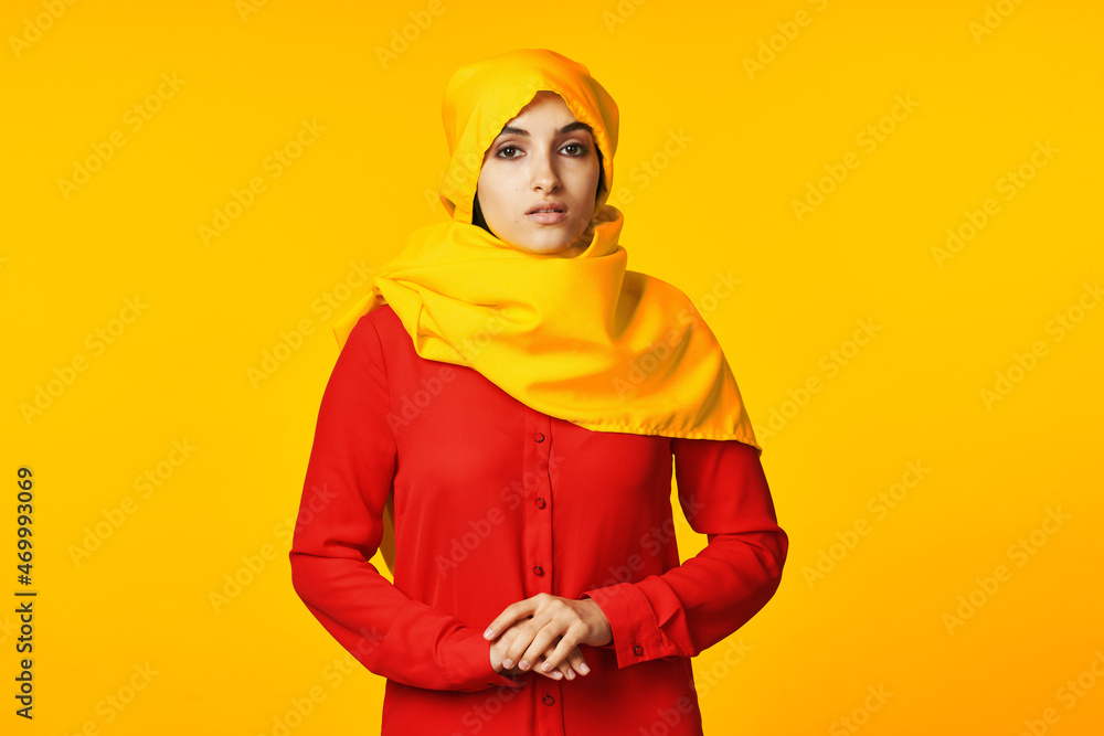 muslim woman wearing yellow hijab posing ethnicity yellow background muslim woman wearing yellow hijab posing ethnicity yellow background