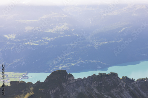 Amazing hiking day in the alps of Switzerland. Wonderful view over a beautiful lake called Brienzersee. What an amazing view. photo