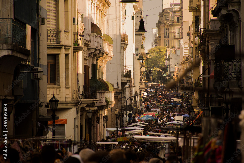 Street with a lot of people in the traditional San Telmo´s fair and typical Buenos Aire´s historical constructions. Argentina at the afternoon
