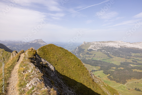 Amazing hiking day in the alps of Switzerland. Wonderful view over a beautiful lake called Brienzersee. What an amazing view. photo