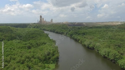 Wallpaper Mural Aerial view of Iguamo River and the cement company, San Pedro De Macorís, Dominican Republic. Toma aérea Río Higuamo San Pedro de Macorís, República Dominicana Torontodigital.ca