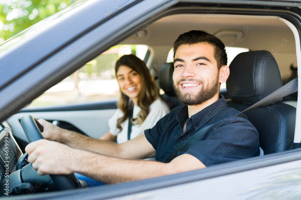 Portrait of a couple enjoying a road trip