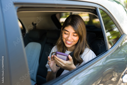 Hispanic passenger using a carpool service