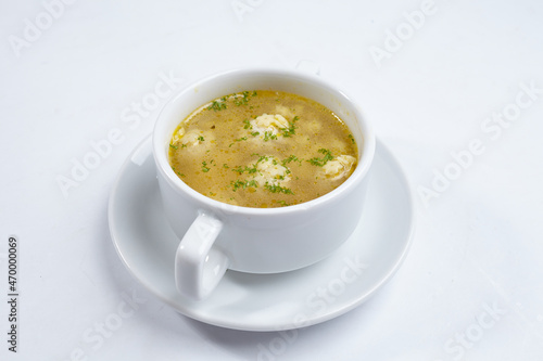 soup with meatballs on the white background