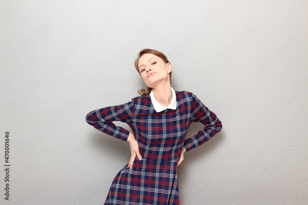 Shot of funny young blond woman making flirtatious grimaces and posing Shot of funny young blond woman making flirtatious grimaces and posing