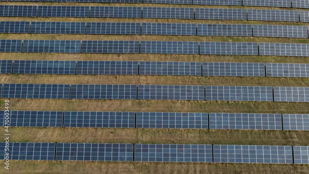 drone flies over a field with solar panels drone flies over a field with solar panels