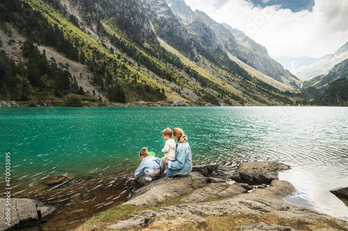 Family near a french lake Gaube in the high pyrenees