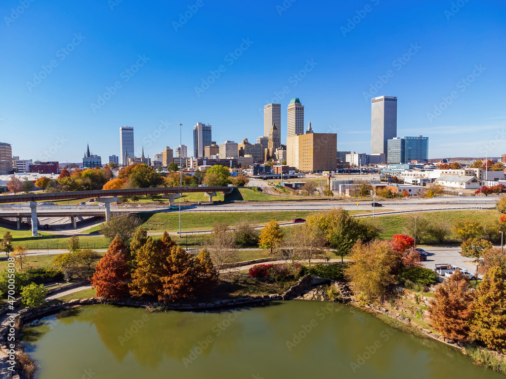 Aerial view of the downtown cityscape and fall color of Veterans Park