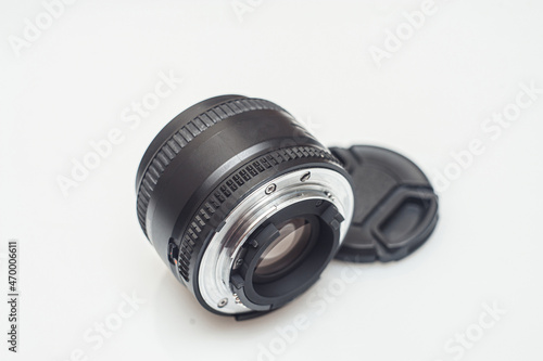 Black camera lens isolated in white background