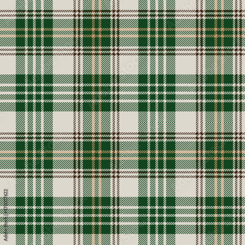 Green and brown tartan plaid. Scottish pattern fabric swatch close-up. 