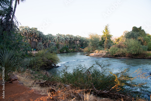 View of Kunene river, in Namibia. Swimming is not allowed because of crocodiles, but rafting is allowed. Adventure travel.