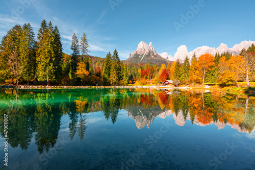 Picturesque view at autumn Welsperg lake in Dolomite Alps. Canali Valley, Primiero San Martino di Castrozza, Province of Trento, Italy. Landscape photography