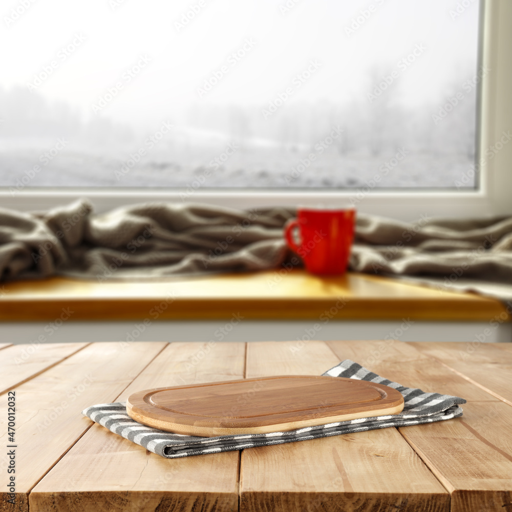 Desk of free space and winter background of window 
