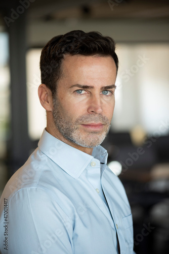 Portrait of thoughtful businessman in office