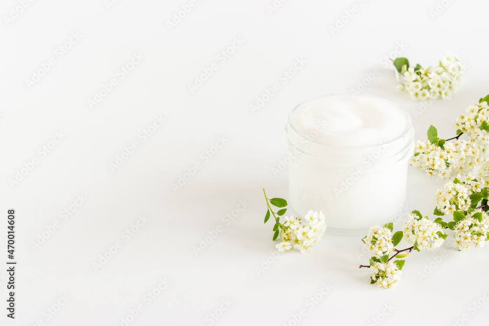 Herbal facial cream cosmetic for skin care with white flowers Herbal facial cream cosmetic for skin care with white flowers