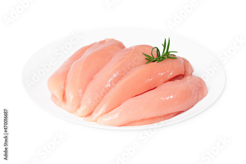 Closeup of chicken meat.Healthy chicken mini inner breast fillets .Close-up of fresh chicken inner fillet on a white plate ,on a isolated background. background from meat.