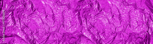 Abstract sparkling purple background. Crumpled texture. Banner. Velvet Violet