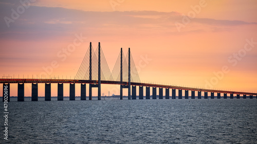 The Öresund Bridge seen from Malmö a summer evening during sunset. © tomalv