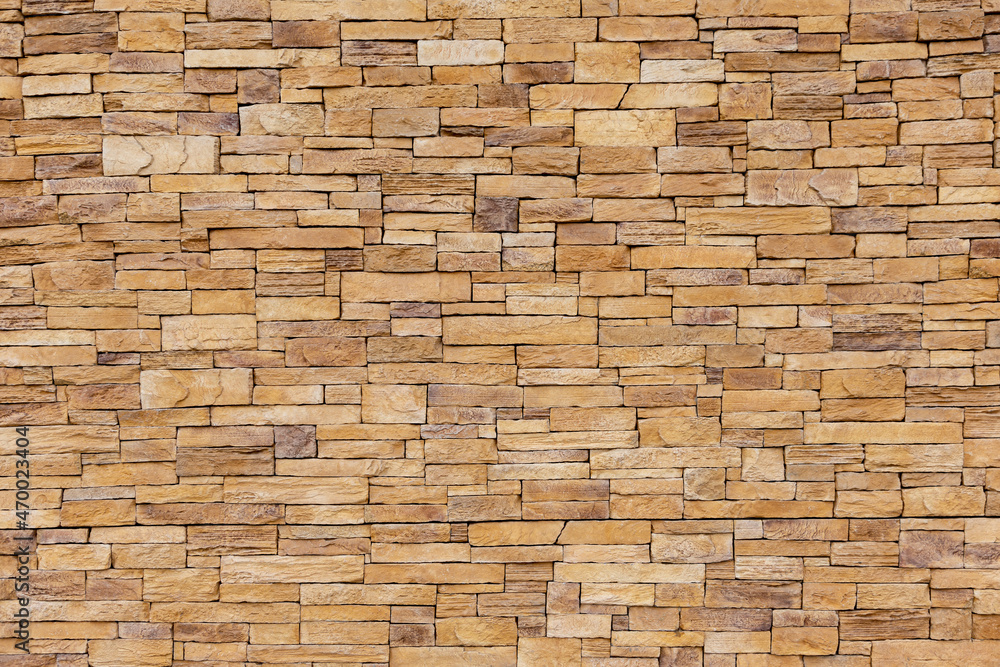 Stone tile of mosaic exterior cover on modern building, material Seamless textured wall background Stone tile of mosaic exterior cover on modern building, material Seamless textured wall background