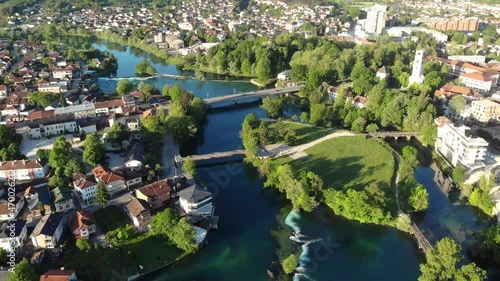 Drone shot of Bihac city center in the morning. The green city in the north of Bosnia is known for the Una river. photo