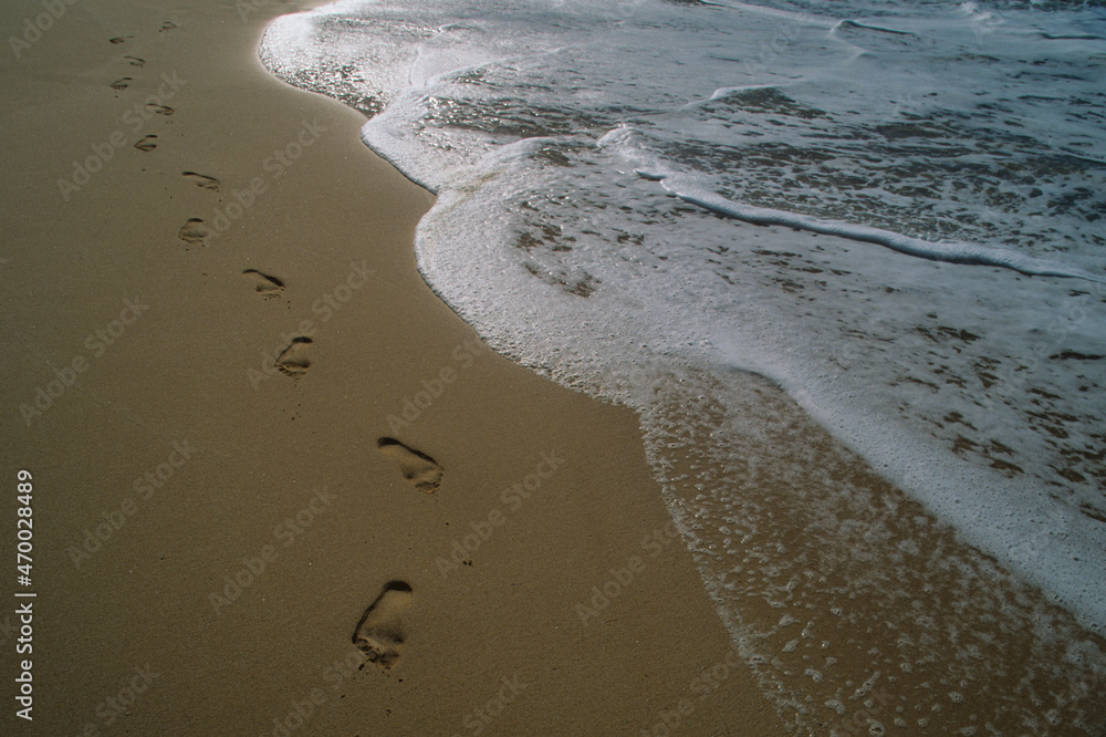 Footprints in the sand in Maui Hawaii