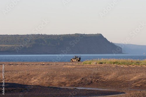 side by side driving along the beach adventure at sunset in saint martins new brunswick canada