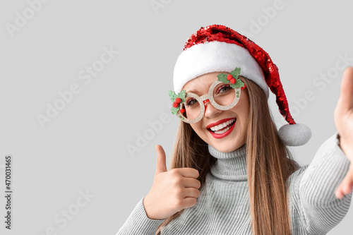 Happy young woman with Chri...