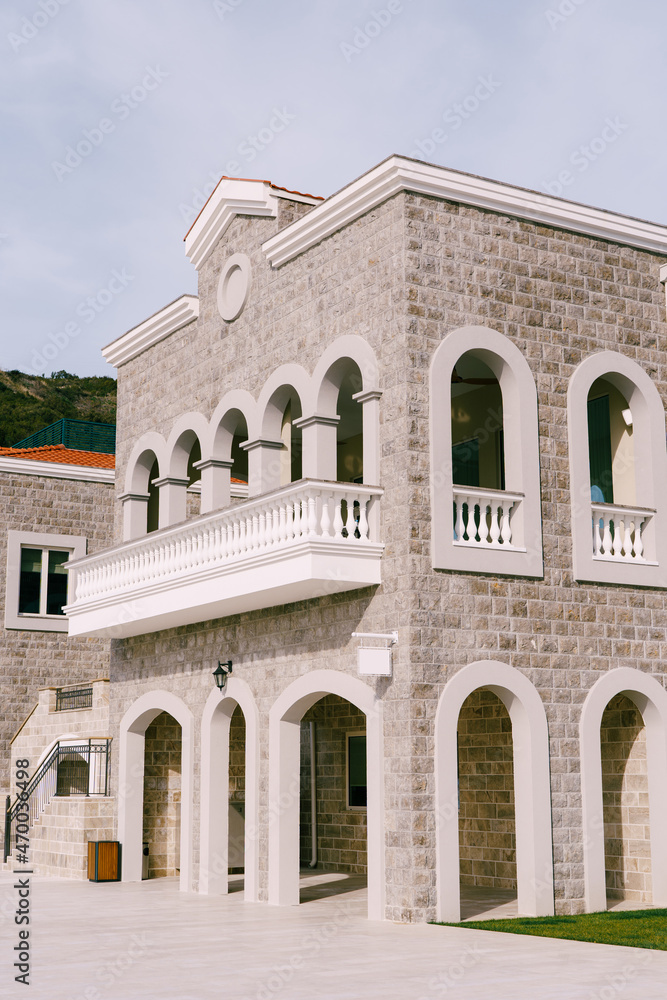 Front of the villa with terraces and balustrades. Lustica Bay, Montenegro