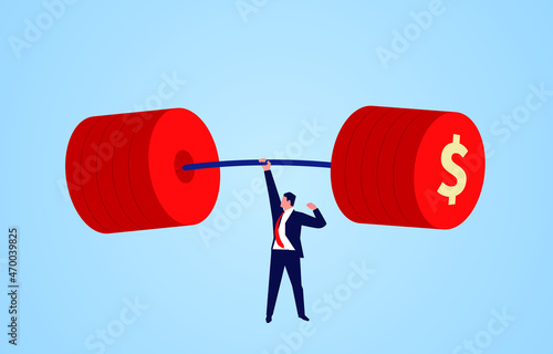 Businessman successfully lifting overweight dollar coin