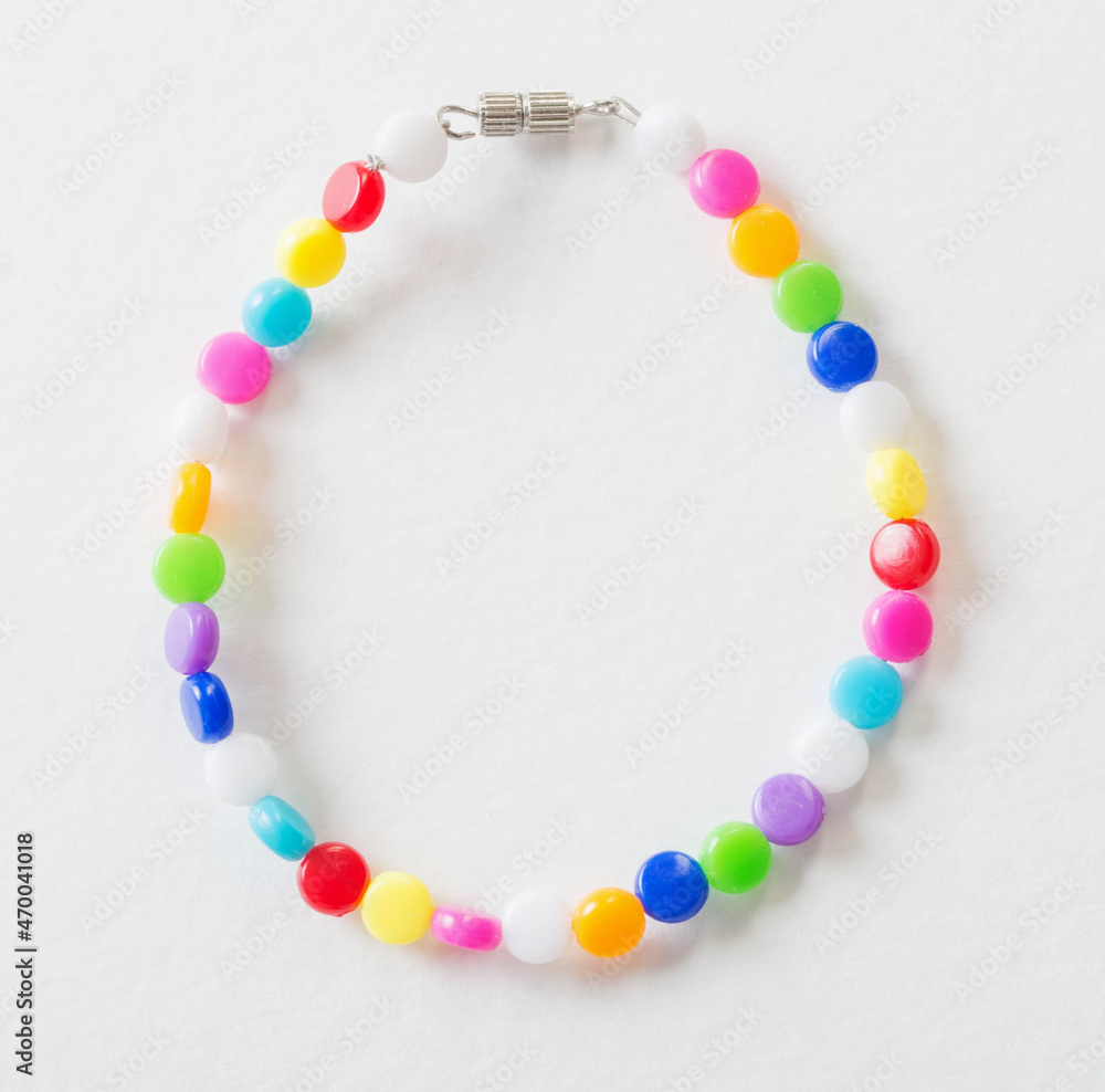 handmade plastic jewerly on white background handmade plastic jewerly on white background