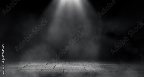 Empty space of Studio dark room concrete floor grunge texture background with spot lighting and fog or mist in black background.