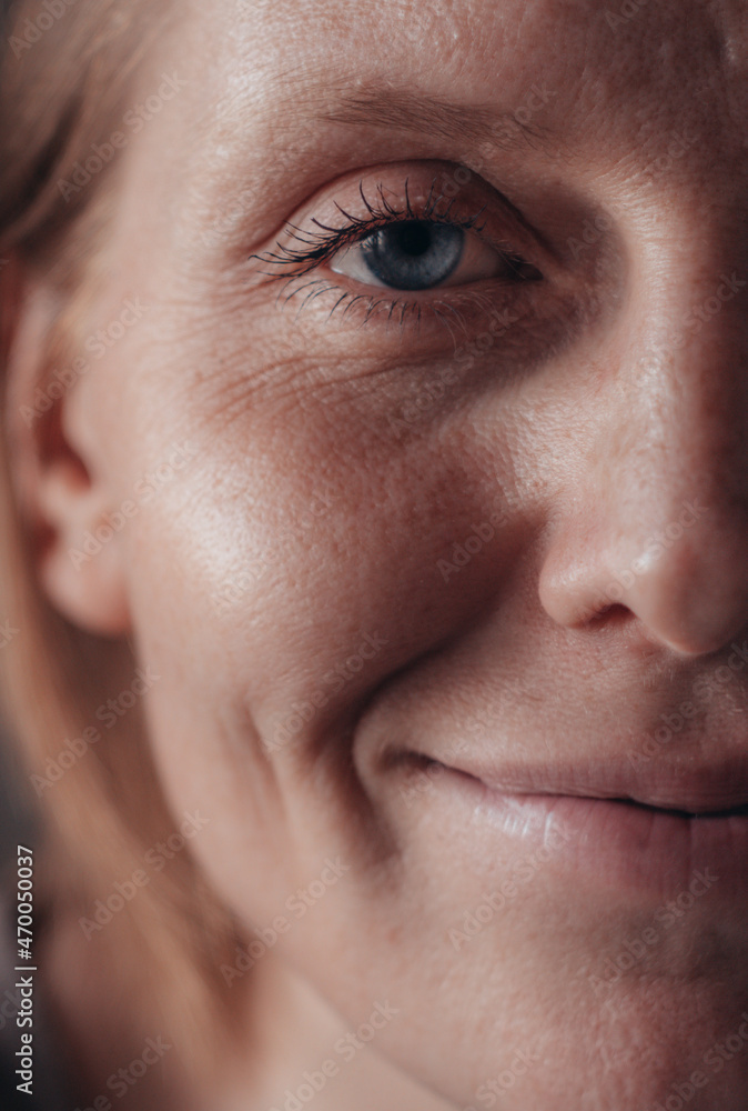 middle aged old woman looking at camera isolated on white background advertising dry skin care treatment anti age skincare beauty, plastic surgery, cosmetology procedures. Close up half face view middle aged old woman looking at camera isolated on white background advertising dry skin care treatment anti age skincare beauty, plastic surgery, cosmetology procedures. Close up half face view