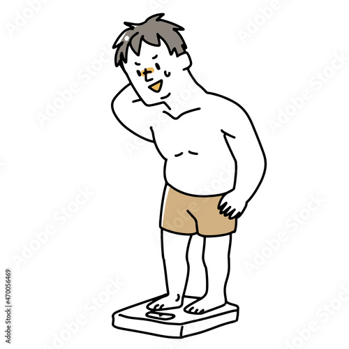 体重計に乗って焦る男性